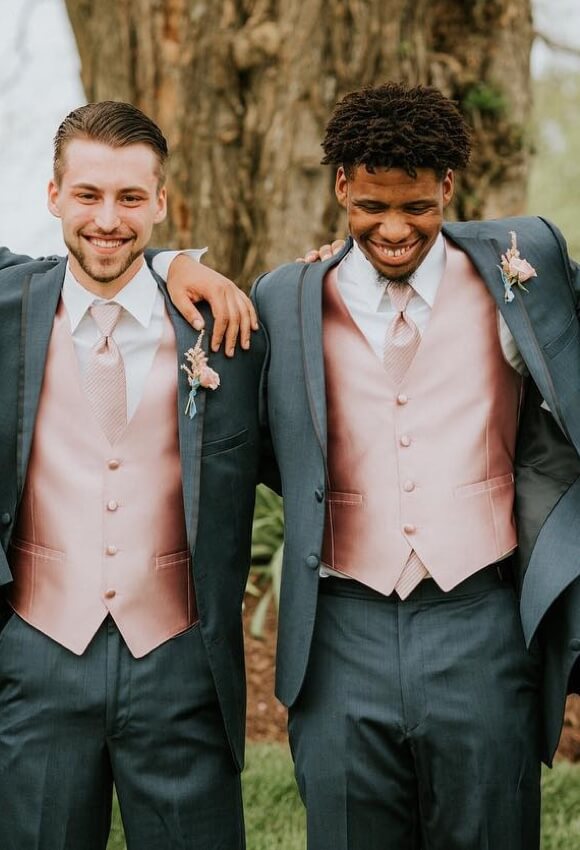 Groomsmen wearing gray Serendiptiy tuxedos and suits