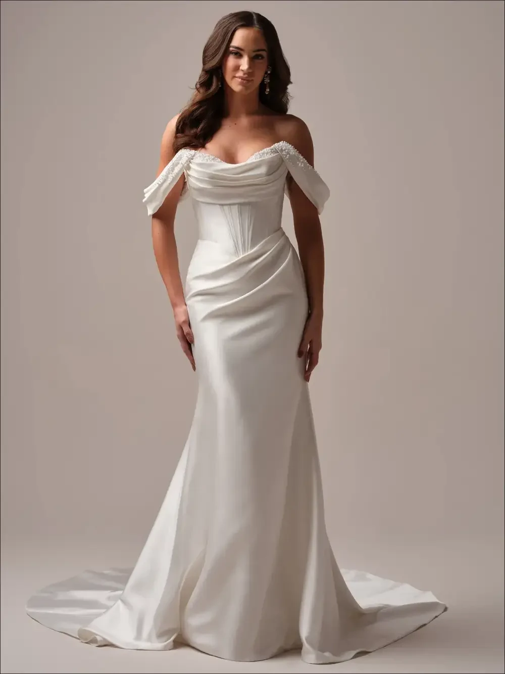 Model wearing white gown