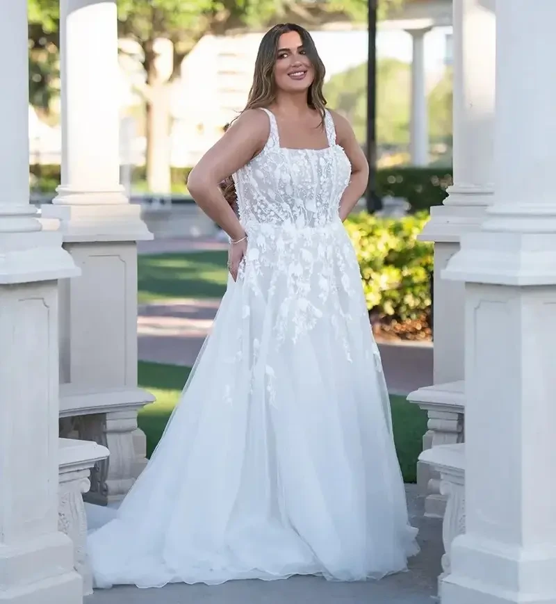 Model wearing white gown