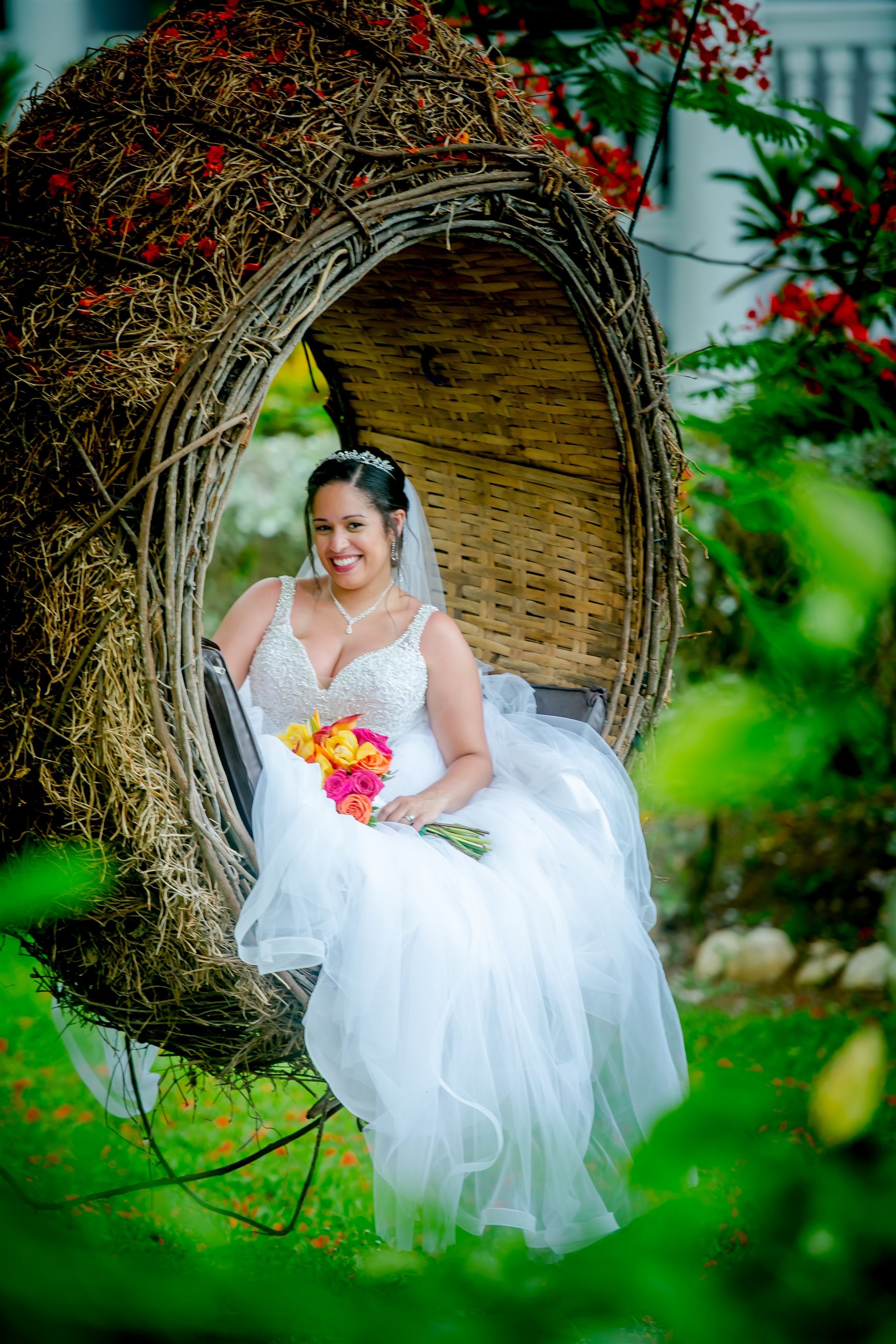 Photo of the real bride sitting in the garden