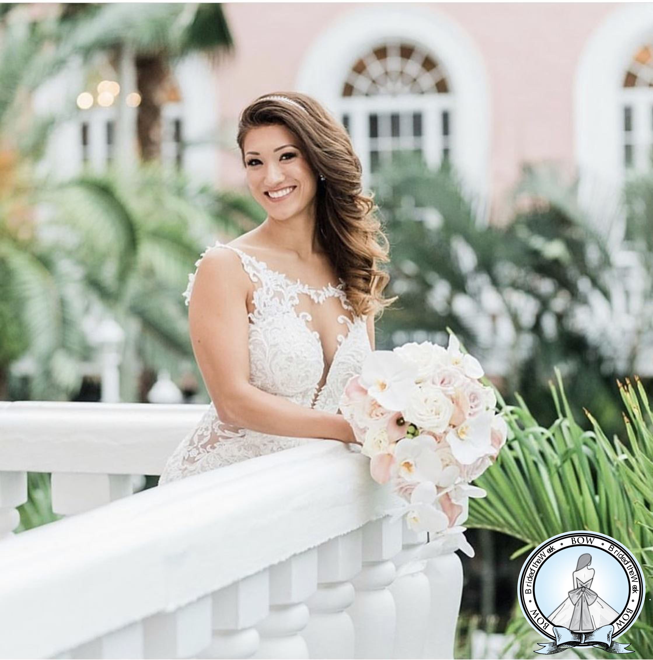 Photo of the Real Bride with a white bouquet